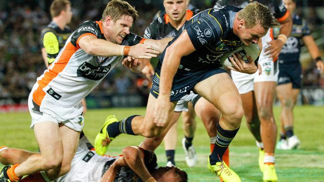 Tigers player Chris Lawrence, left, was once a member of the NSW team.