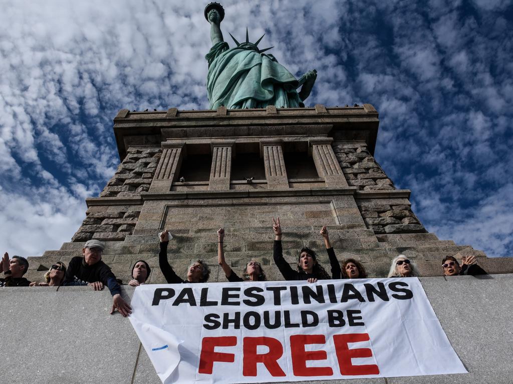 Activists from Jewish Voice for Peace occupy the pedestal of the Statue of Liberty in New York City. Picture: Stephanie Keith/Getty Images