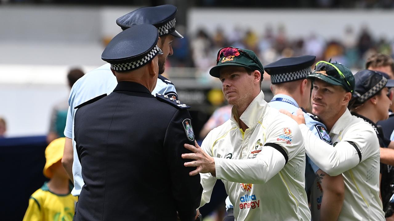 Steve Smith and the Australian team members pay their respects. Picture: Bradley Kanaris/Getty