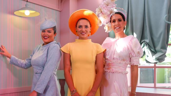 Racegoers pose for a photo in the Park precinct. Picture: Getty Images