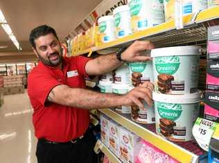 NEW OPTIONS: Coles Riverlink store manager Jamie Andrews stocks bulk goods on the shelves of the North Ipswich store. Picture: Rob Williams