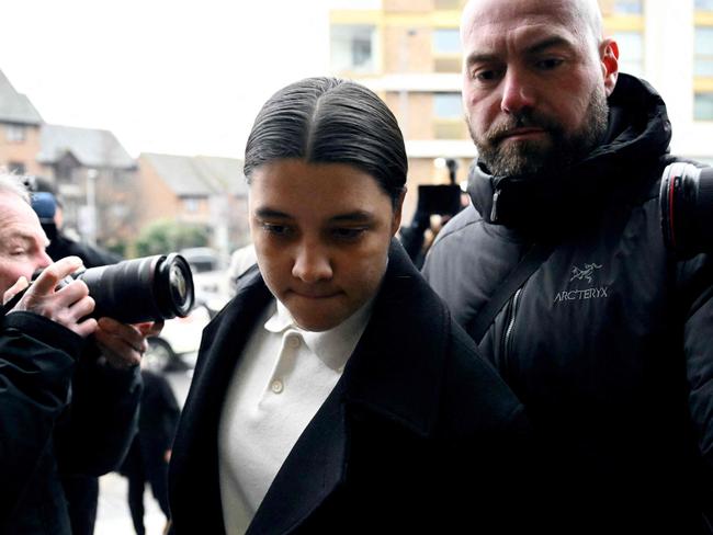 Chelsea's Australian striker Sam Kerr (C) arrives at Kingston Crown Court in south London on February 10, 2025. Prosecutors in the trial of Kerr, who called a police officer "stupid and white", have asked the jury if perceptions would be different had she said "stupid and black". The Australia captain is on trial charged with causing racially aggravated harassment, which she denies, to police constable Stephen Lovell during an incident in southwest London in the early hours of January 30, 2023. (Photo by Ben STANSALL / AFP)