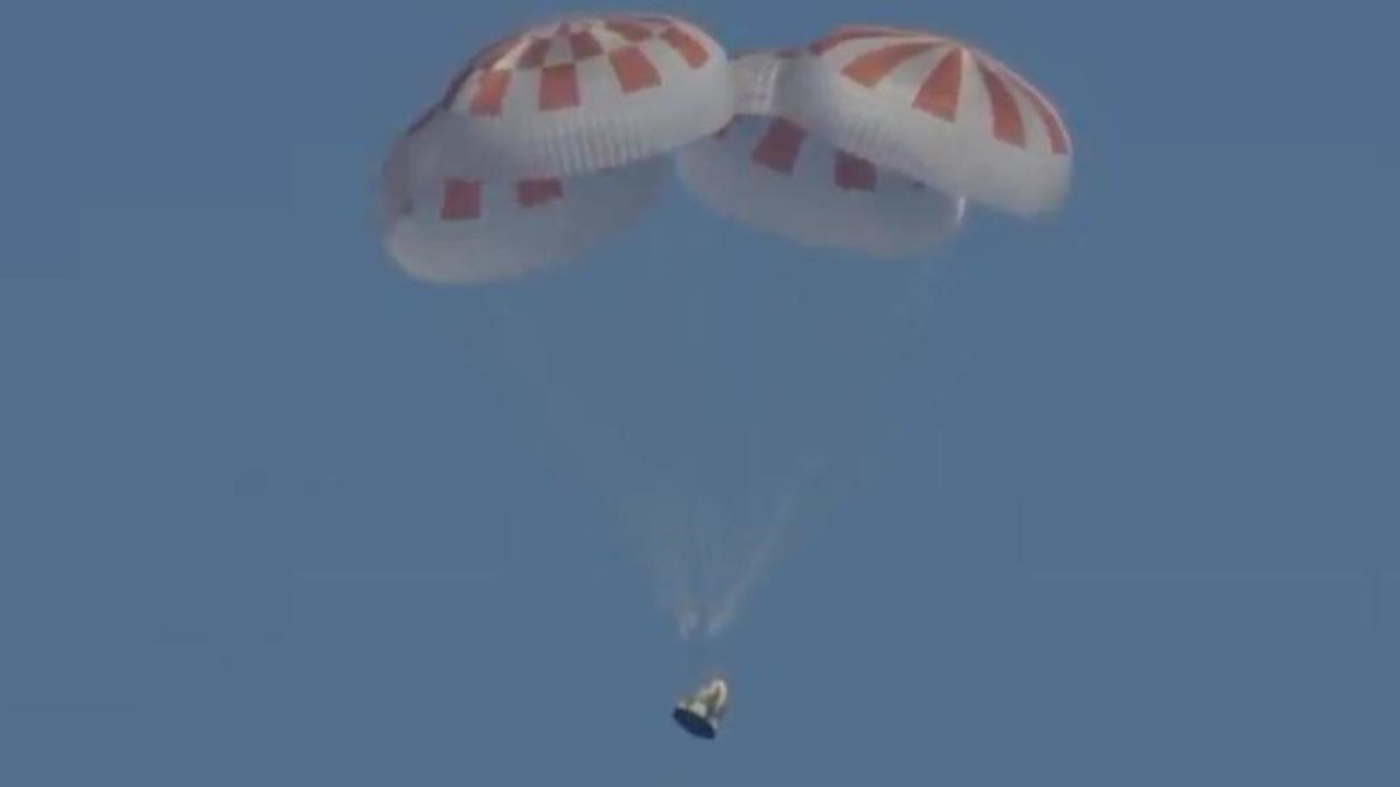 SpaceX triumphs with successful round-trip flight of astronaut taxi capsule