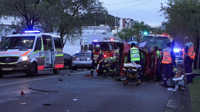 Emergency services at the scene of the fatal crash on Manns St near the intersection of Dwyer St, North Gosford. Picture: Digicrew Australia