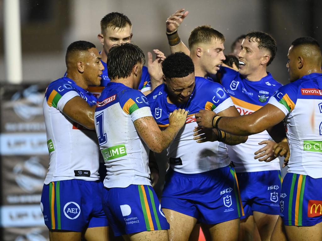 Raiders players celebrate after Simis Sasagi scores a try. Picture: NRL Imagery