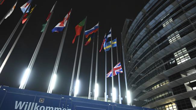 Britain's Union flag is lowered form its pole outside the European Parliament in Strasbourg, eastern France. Picture: AP