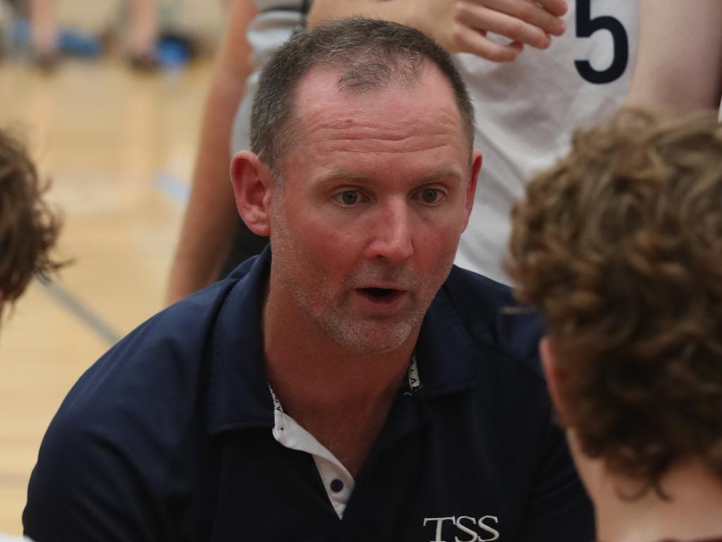 Basketball Australia Schools Championships at Carrara. Mens open final, Lake Ginninderra College Lakers V TSS (in white). Tss's coach talks to his players in the final. Picture Glenn Hampson