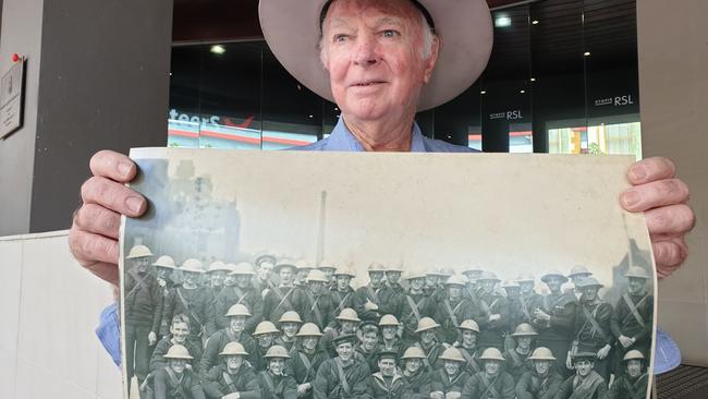 HONOUR: Vietnam veteran Ray Hiddlestone with a photograph of WW1 troops from his father's war album. Photo: Frances Klein