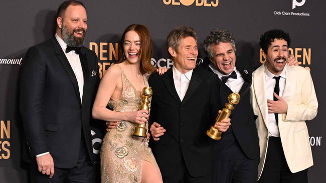 Greek director Yorgos Lanthimos, with Poor Things stars Emma Stone, Willem Dafoe, Mark Ruffalo and Ramy Youssef. Picture: AFP