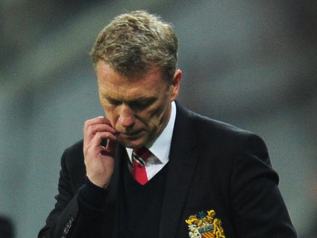 MUNICH, GERMANY - APRIL 09: David Moyes, manager of Manchester United looks dejected during the UEFA Champions League Quarter Final second leg match between FC Bayern Muenchen and Manchester United at Allianz Arena on April 9, 2014 in Munich, Germany. (Photo by Shaun Botterill/Getty Images)