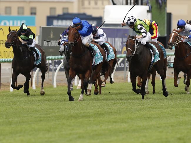 GOLD COAST, AUSTRALIA - JANUARY 11: James McDonald (R) riding Madam Rouge wins the $1Million Its Live! In Queensland Magic Million Snippets race defeating Robbie Fradd ridden Isaurian during the 2019 Magic Millions at the Gold Coast Turf Club on January 11, 2020 in Gold Coast, Australia. (Photo by Regi Varghese/Getty Images)