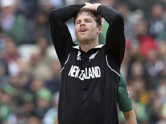 New Zealand's bowler Lockie Ferguson reacts after his delivery against Pakistan's batsman Mohammad Hafeez during the Cricket World Cup match between New Zealand and Pakistan at the Edgbaston Stadium in Birmingham, England, Wednesday, June 26, 2019. (AP Photo/Rui Vieira)