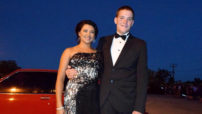 Chloe Howlett and Mac Wendt pose after stepping out of their car at the Roma State College formal. Photo Tom Gillespie / Western Star