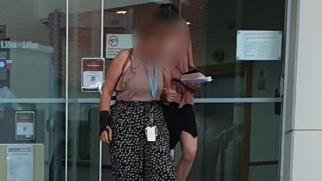 The defendant (right) leaving Rockhampton Courthouse on October 18, 2021. Picture: Aden Stokes