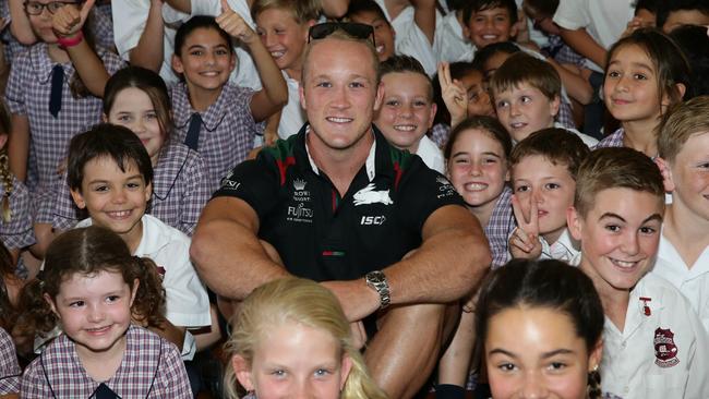 He has always been proud of the club’s connection with the community. Pictured here with Pagewood Public School. Picture: Craig Wilson