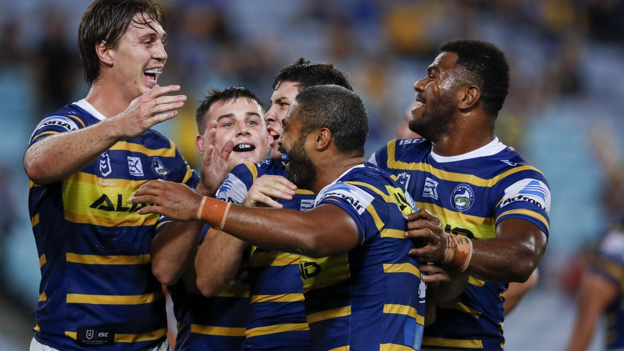 Michael Jennings celebrates with teammates after scoring last night