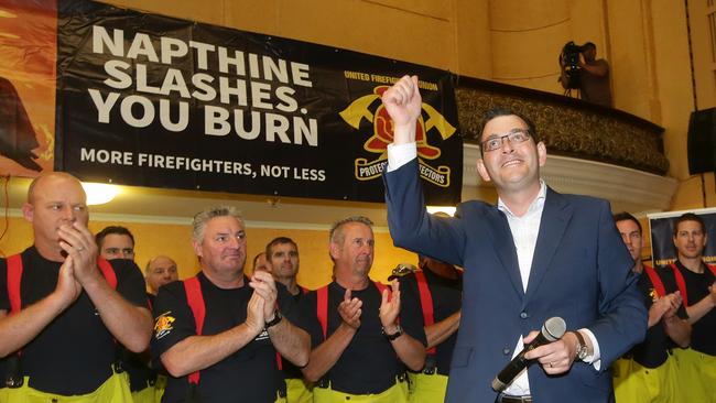 Daniel Andrews campaigning with firefighters in 2014.