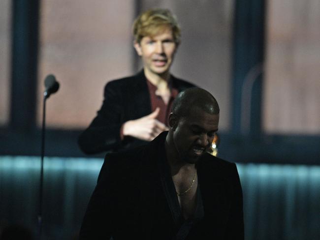 Not your turn Kanye ... Beck reacts as Kanye West leaves the stage. Picture: AFP