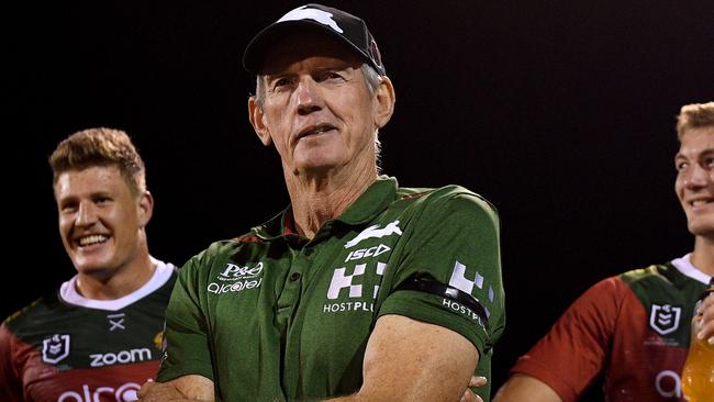 Rabbitohs coach Wayne Bennett (centre) speaks with players following their win over the Dragons in the Charity Shield NRL pre-season match between the St George-Illawarra Dragons and the South Sydney Rabbitohs at Glen Willow Stadium in Mudgee, NSW, Saturday, March 2, 2019. (AAP Image/Dan Himbrechts) NO ARCHIVING, EDITORIAL USE ONLY