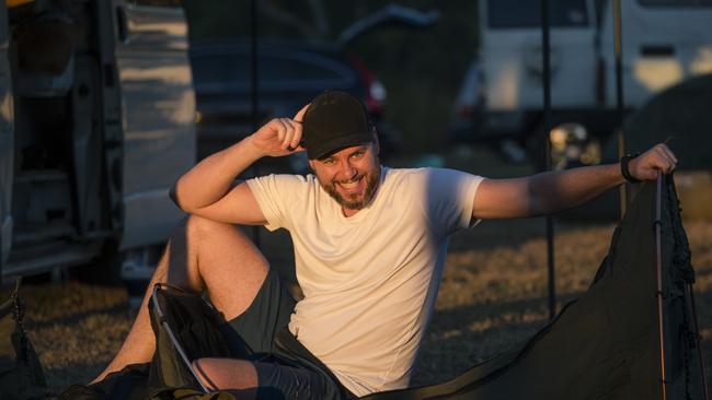 BARUNGA, AUSTRALIA - NewsWire Photos - JUNE 08, 2024: Luke Addison sets up camp as the annual Barunga Festival, 375 km south of Darwin as the community of Barunga opens its doors to the world in a celebration of Culture, Sport and Art Picture: NewsWire / Glenn Campbell