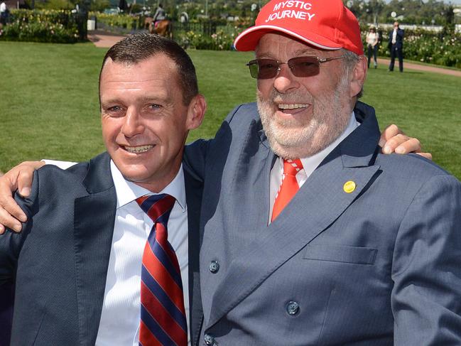 Trainer Adam Trinder and owner Wayne Roser after Mystic Journey won the Group 1 Australian Guineas in March.