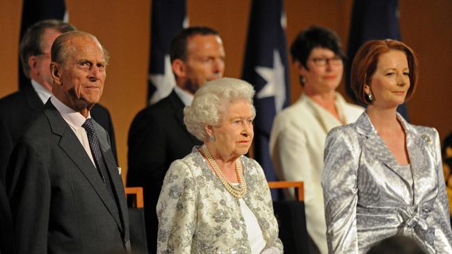 Tony Abbott with the Queen, Prince Philip and then-prime minister Julia Gillard.