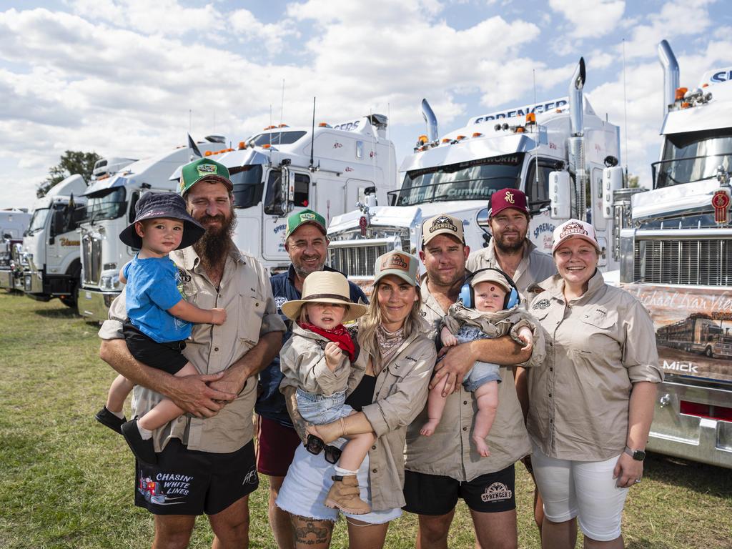 The Sherlock, Hutchinson and Wendt families pay their respects to those who lost their lives from the trucking community at Lights on the Hill Trucking Memorial at Gatton Showgrounds, Saturday, October 5, 2024. Picture: Kevin Farmer