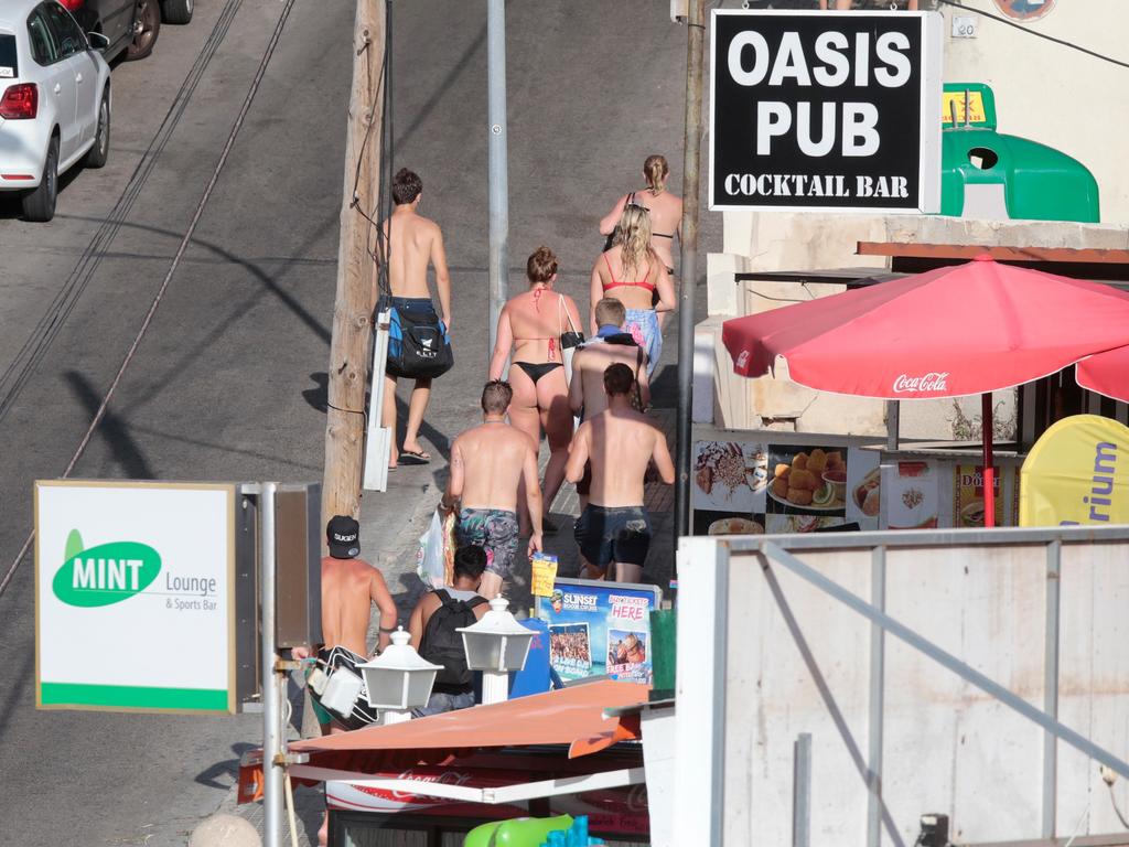 Billboard posters have been put up around Malaga asking visitors to wear full clothes while touring the city. Picture: Alamy