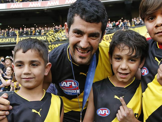 2019 AFL Grand Final match between the Richmond Tigers and the GWS Giants at the MCG on September 28, 2019 in Melbourne, Australia. Richmonds Tigers victory lap. Marlion Pickett celebrates with possible relatives kids.   Picture: David Caird