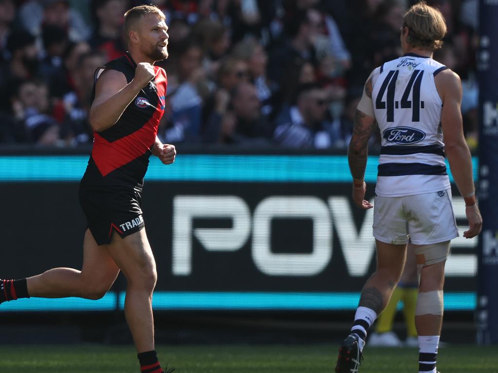 MELBOURNE, AUSTRALIA - APRIL 30: Jake Stringer of the Bombers celebrates after scoring a goal during the round seven AFL match between Essendon Bombers and Geelong Cats at Melbourne Cricket Ground, on April 30, 2023, in Melbourne, Australia. (Photo by Robert Cianflone/Getty Images)