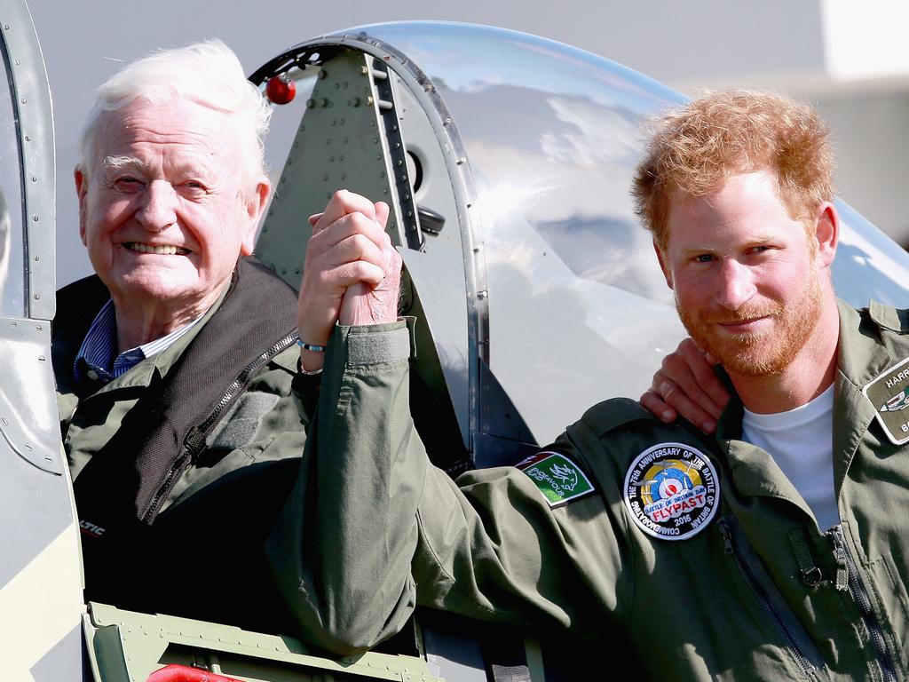 Prince Harry poses next to 95 year old Battle of Britain Veteran Tom Neil after he landed back at Goodwood Aerodrome in his Spitfire after a Battle of Britain Flypast in Chichester, England. Picture: Getty