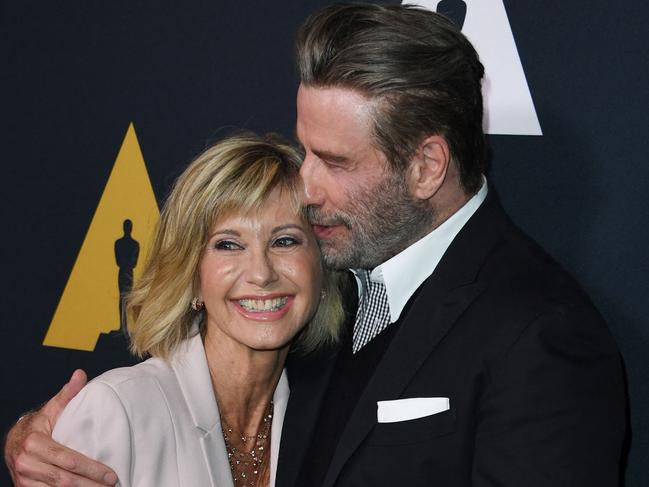 Olivia Newton-John and John Travolta celebrate the 40th anniversary of Grease in 2018. Picture: AFP