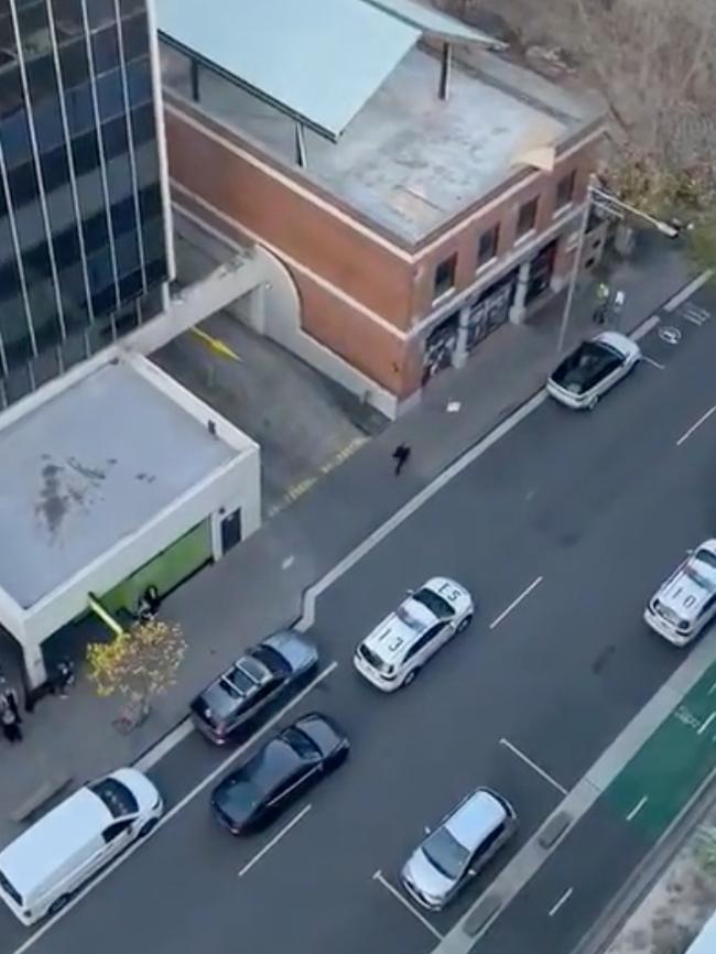 Police on the scene at Spring Street in Bondi Junction.