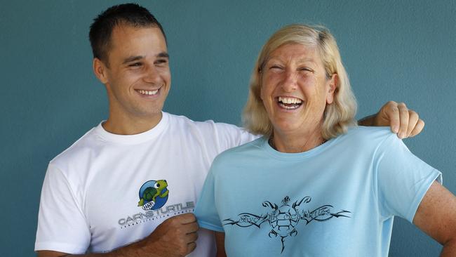 <span id="U70197194217712B" style="font-weight:bold;font-style:normal;">FUNDRAISER:</span> Conservationist Christian Miller with Cairns Turtle Rehabilitation Centre founder Jenny Gilbert and T-shirts he produced to raise money for the turtle hospital on Fitzroy Island.