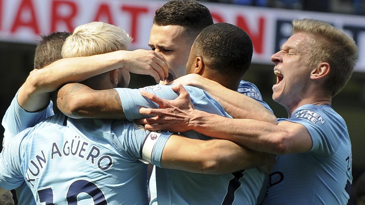 Manchester City's players celebrate a goal of Phill Foden, against Tottenham during the English Premier League soccer match between Manchester City and Tottenham Hotspur at Etihad stadium in Manchester, England, Saturday, April 20, 2019. (AP Photo/Rui Vieira)