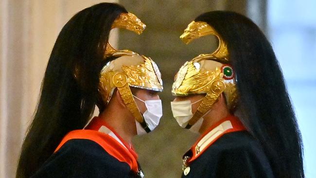 Corazzieri, of the Italian military Presidential honour guards, stand guard at the Quirinale Palace in Rome. Picture: AFP