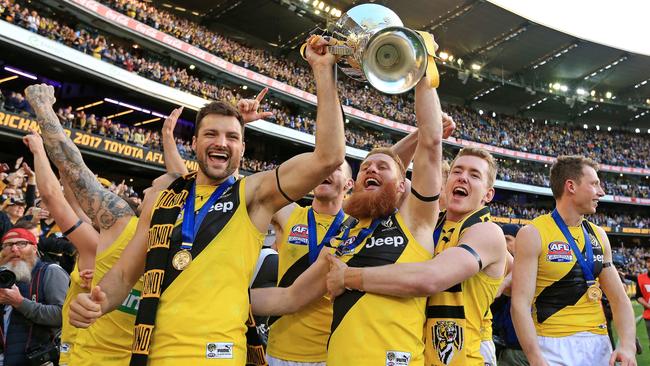 Toby Nankervis and Nick Vlastuin lift the cup. Picture: Mark Stewart