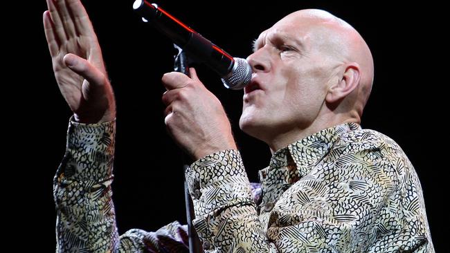 Peter Garrett of Midnight Oil performs on stage at the MCG. Picture: Lucas Dawson/Getty Images