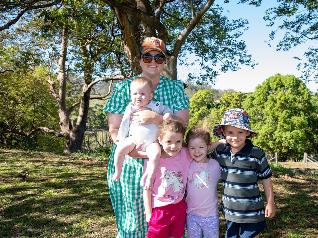 Archie and his mother Lucy Dugan, Annabelle Fletcher, Olivia Dugan and Charlie Fletcher supporting their Downlands brother and cousin player Jimmy Fletcher. Picture: Bev Lacey