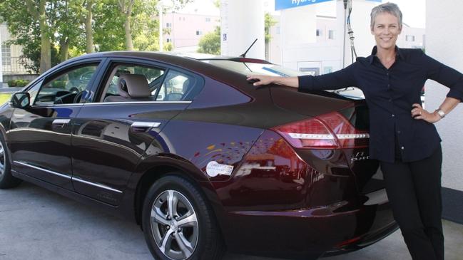 Jamie Lee Curtis, second customer of Honda's FCX Clarity hydrogen fuel cell-powered vehicle, at a hydrogen filling station in West Los Angeles. Picture: American Honda. Mandatory credit: Alex Berliner Berliner Studio/BEImages.