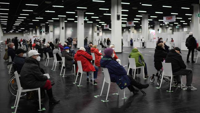 Elderly people wait at a vaccination centre in Cologne, western Germany. Picture: AFP