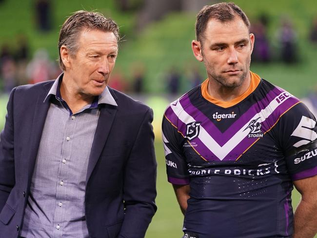 Craig Bellamy, coach of the Melbourne Storm and Cameron Smith talk during the Round 25 NRL match between the Melbourne Storm and the North Queensland Cowboys at AAMI Park in Melbourne, Friday, September 6, 2019. (AAP Image/Scott Barbour) NO ARCHIVING, EDITORIAL USE ONLY