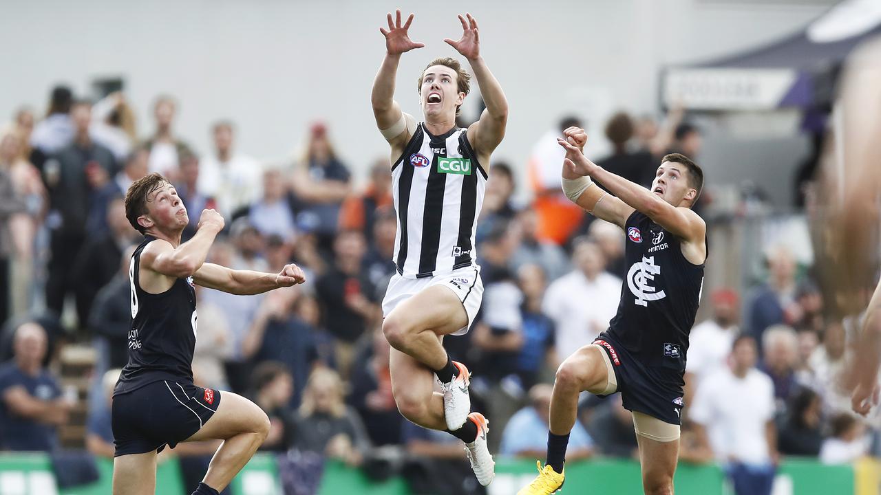 Tyler Brown flies for a mark during a pre-season practice match against Carlton. Picture: Getty