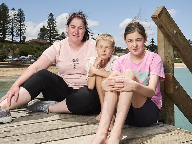 Locals, Tara Gray with her kids Riley Gray, 8, and Ariana Gray, 12, in Port Elliot, where the Horseshow Bay pontoon has been removed, Sunday, Nov. 17, 2024. Picture: Matt Loxton