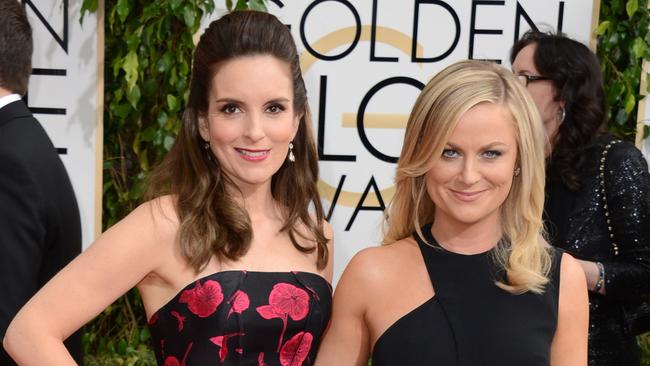 Dynamic duo ... Tina Fey and Amy Poehler are back again as hosts of the Golden Globe Awards. Picture: AP