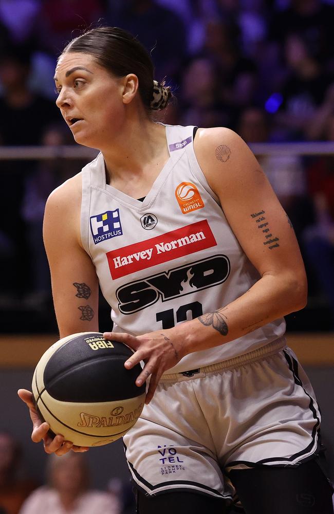 Cayla George of the Flames takes a rebound during the round 12 WNBL match between Geelong United and Sydney Flames at The Geelong Arena, on January 17, 2025, in Geelong, Australia. (Photo by Kelly Defina/Getty Images)