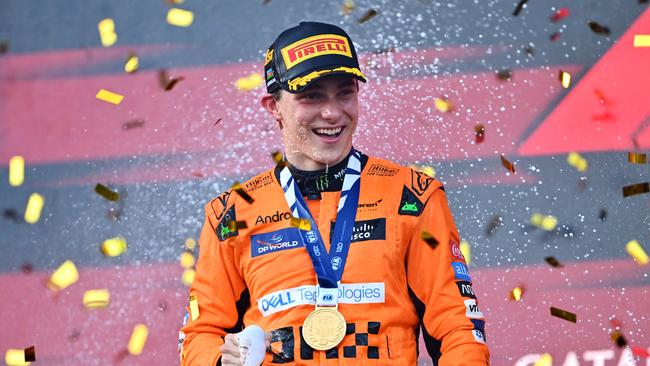 BAKU, AZERBAIJAN - SEPTEMBER 15: Race winner Oscar Piastri of Australia and McLaren celebrates on the podium during the F1 Grand Prix of Azerbaijan at Baku City Circuit on September 15, 2024 in Baku, Azerbaijan. (Photo by Dan Mullan/Getty Images)