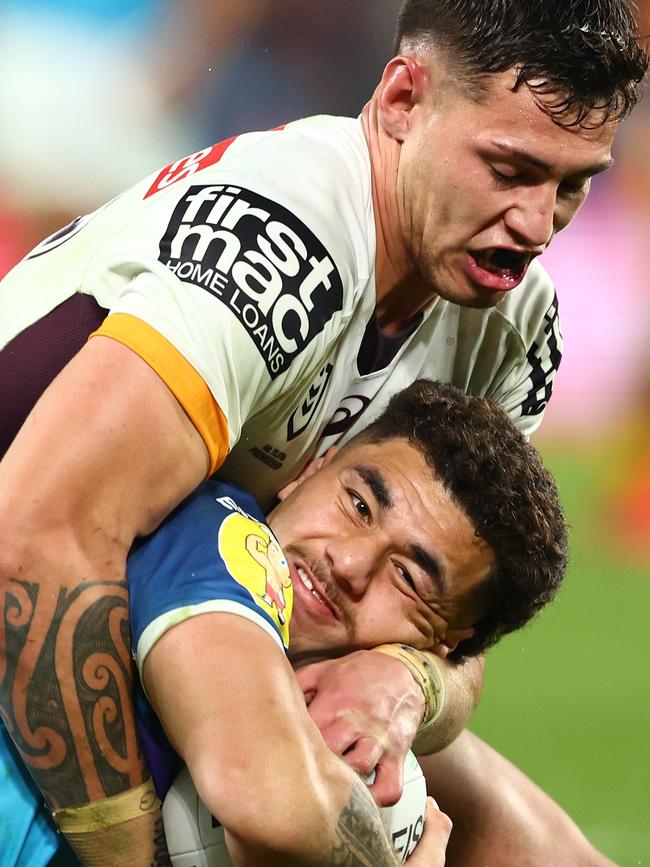 Jojo Fifita of the Titans is tackled during the round 18 NRL match between the Gold Coast Titans and the Brisbane Broncos at Cbus Super Stadium, on July 16, 2022, in Gold Coast, Australia. (Photo by Chris Hyde/Getty Images)