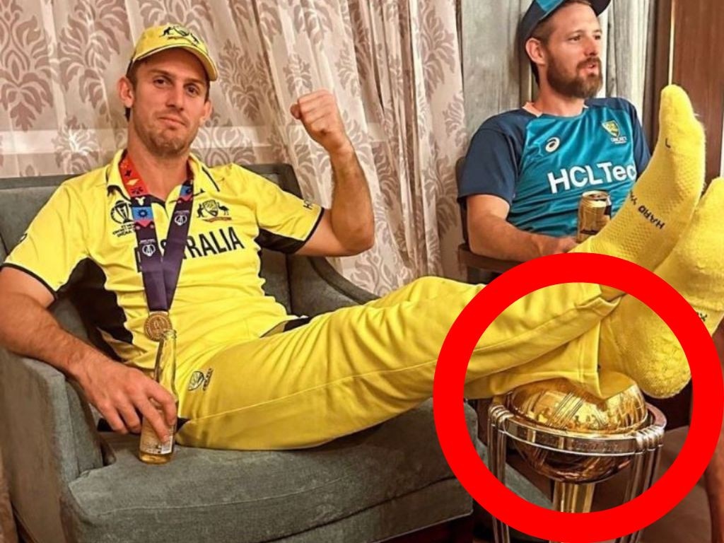 The offending photo of Mitch Marsh and the World Cup trophy. Photo: Twitter