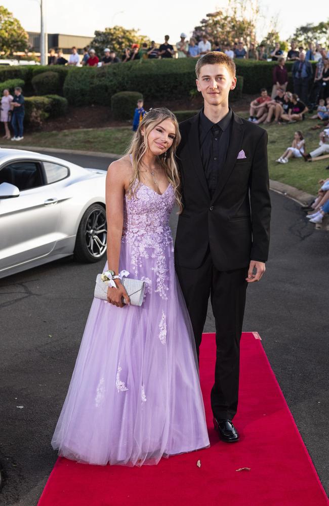 Graduate Belle Berry and partner Kai George arrive at Mary MacKillop Catholic College formal at Highfields Cultural Centre, Thursday, November 14, 2024. Picture: Kevin Farmer